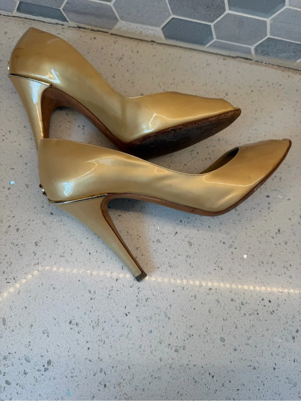 Name Your Price. CHANEL Gold Patent Leather Heels with CC Logo